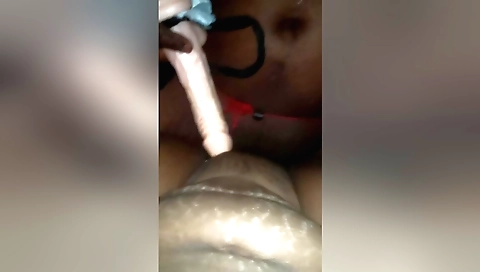Indian bitch gets her hairy pussy penetrated with a toy