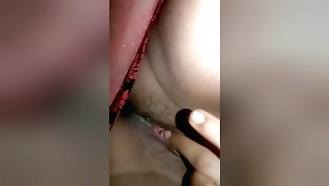 Indian girl in red dress riding her own dick in the desert
