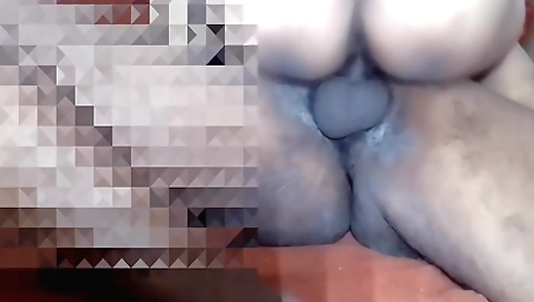 Indian wife is playing with her husband's penis in bed