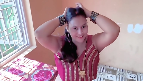 Indian mature wife is showing off her big tits and a fat body