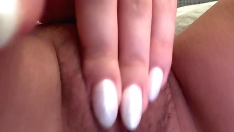 Indian girl in white lingerie enjoys her hairy pussy