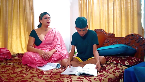 Indian busty stepmom teaches her stepson how to do sex