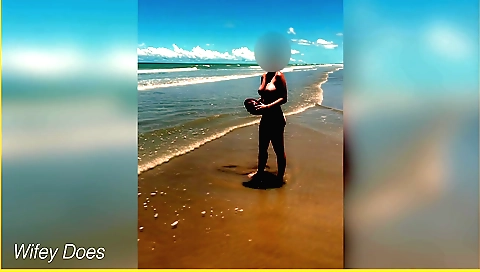 Wifey strips naked and plays with football at the beach