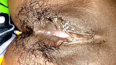 Hairy pussy eating from the guy's mouth while he is abroad