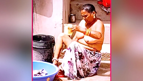 Busty Indian granny showing her sexy body in hot action