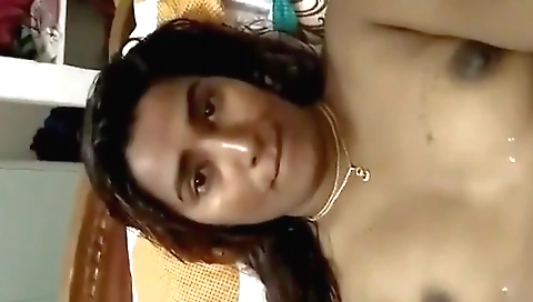I am fingering my clit and my boobs in amateur solo video