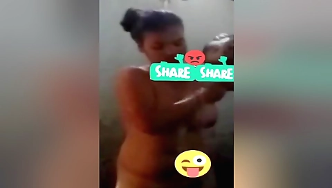 Indian girl is naked in the shower and she is blowing her pussies