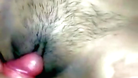 Indian hairy brunette eating a pink mushroom while licking