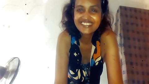 Indian pornstar in a small black dress is showing her body