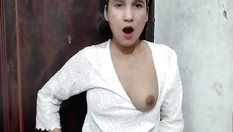 Solo girl wearing white dress and leather shorts in shower