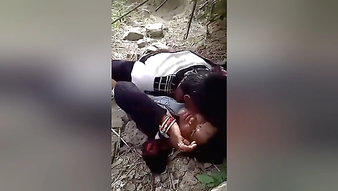 Indian brunette in a black dress and panties fucked outdoors