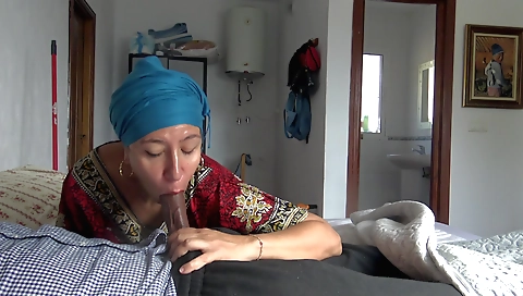 Handjob from the hotel room with a black-haired milf