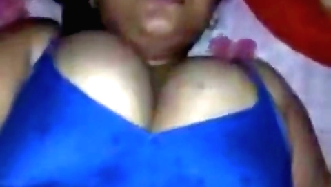Big tits Indian bhabhi fucks with a man in the living room