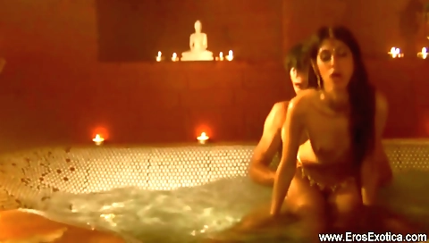 A sexy brunette is getting fucked on the floor by a guy