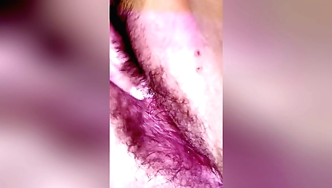 Horny naked girl with a hairy pussy gets naked and masturbates