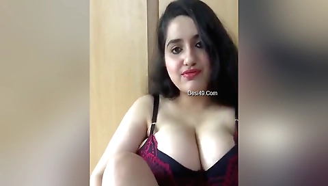 Busty amateur indian babe with big tits plays in web cam