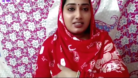 Amateur brunette in a sexy dress giving a blowjob to her lover