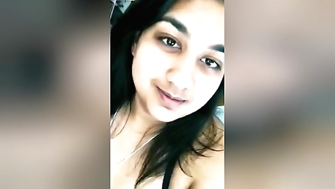Cute brunette amateur in sexy lingerie and a sexy dress