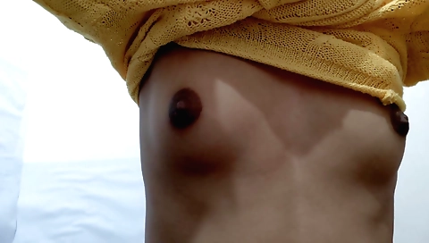 Indian girl plays with her big black cock in front of the camera