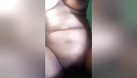 Indian slut masturbates herself on the bathroom bed